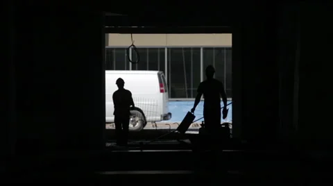 Backlit Construction workers Stock Footage 63917237