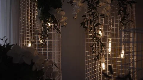 Backlit decor on a stand for a background decorated with live design Stock Footage 306148115