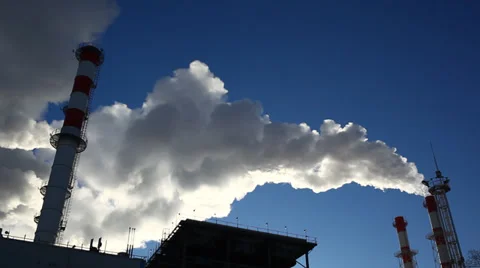Backlit dense smoke from power plant chimneys Stock Footage 34278621