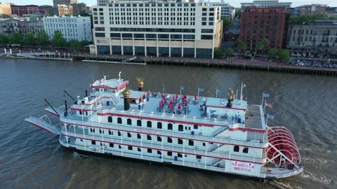 Backlit Drone Shot of Savannah River Queen Boat in Savannah Georgia  Passing Stock Footage 245454791