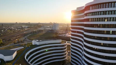 Backlit facade reflections on layered white architecture Stock Footage 331196664