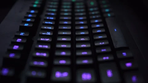 Backlit Illuminated Keyboard Keys in a Close-up Zoom Stock Footage 101256229
