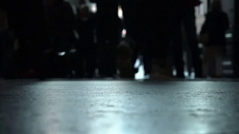 Backlit image of people walking at the exit of a building Stock Footage 71409166