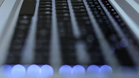 Backlit keyboard close up. Stock Footage 73800026