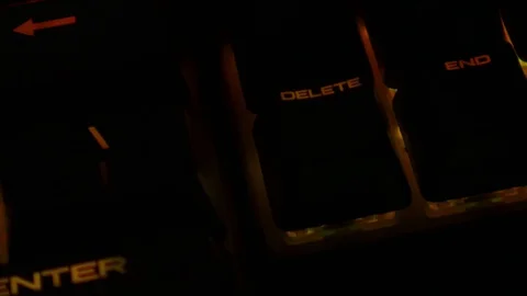 Backlit keyboard at home. Colored light. Mechanical keyboard. Working office. Video stock 129810485