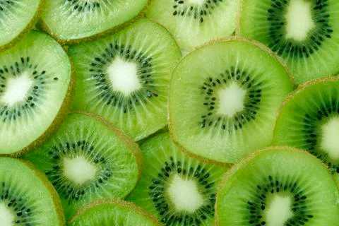 Backlit kiwi slice Stock Photos