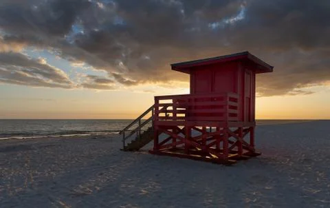 Backlit Lifeguard Tower at Sunset Stock Photos