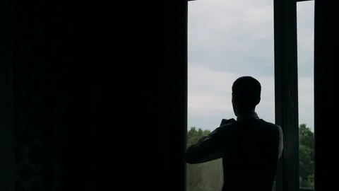 Backlit man with a jacket unusual shot	 Stock Footage 272296218