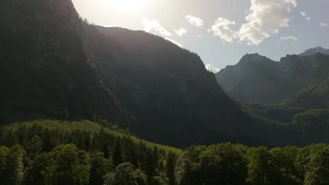 Backlit Mountain Valley Aerial Push In Berchtesgaden Germany 스톡 동영상 336394826
