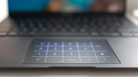 Backlit numeric keypad in a modern latest generation laptop. Stock Photos