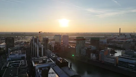 Backlit orbit over harbour basin at sunset Video stock 331196528