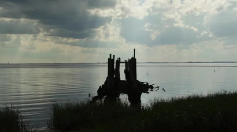 A Backlit Pier in the Gulf of Mexico Vídeo Stock 49644452