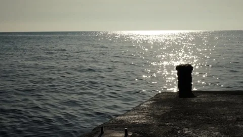Backlit pier on the sunset by the sea, slow motion HD Stock-Footage 74492035