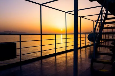 Backlit at ship deck of ferry boat on early dawn, Sunrise Stock Photos
