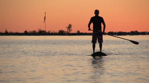 Backlit slow motion SUP Vídeo Stock 48916753