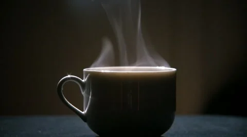 Backlit steaming hot coffee Stock Footage 890027