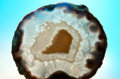Backlit thin slice of natural agate Stock Photos