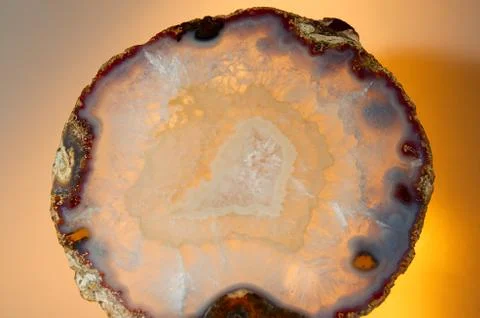 Backlit thin slice of natural agate Stock-Fotos