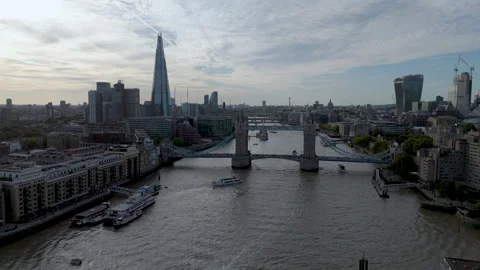 Backlit Tower Bridge and The Shard Aerial Stock Footage 346638284