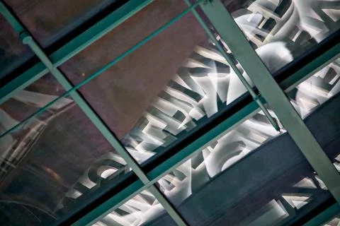 Backlit typographic ceiling through glass panels Stock Photos