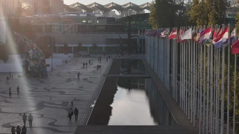 Backlit view of pedestrian path towards Oriente train station in Lisbon Video stock 318462829