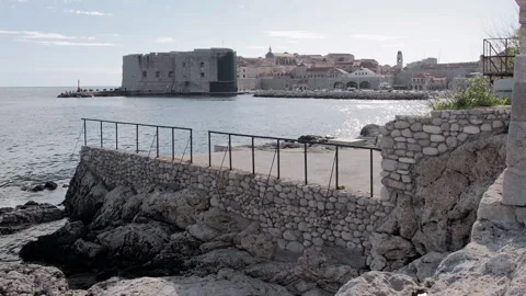Backlit view of St Johns Fortress and Old Town port, Dubrovnik, Croatia, 4K Stock-Footage 274455387