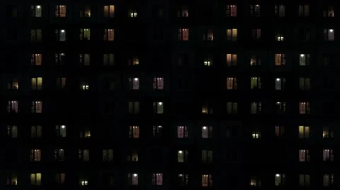 Backlit Windows of an Apartment Complex at Night Vidéo 48875792
