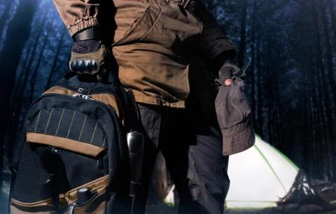 Backpack and gear woods composition. Stock Photos
