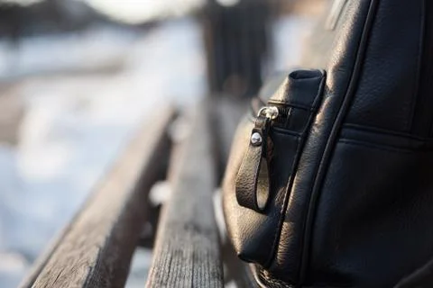 Backpack on the bench Stock Photos
