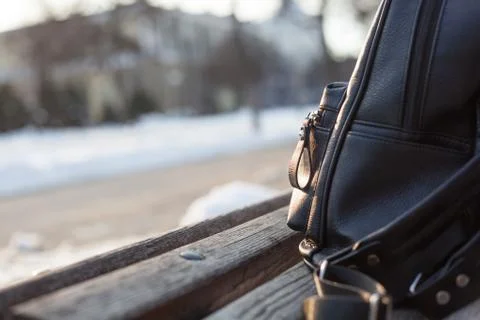 Backpack on the bench Stock Photos