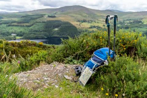 Backpack, binoculars, map and sticks on the mountain, mountain lifestyle in I Stock Photos