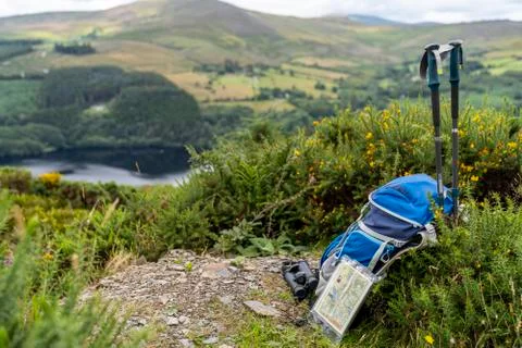 Backpack, binoculars, map and sticks on the mountain, mountain lifestyle in I Stock Photos
