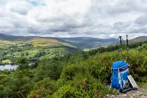Backpack, binoculars, map and sticks on the mountain, mountain lifestyle in I Stock Photos
