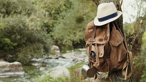 Backpack hanging from a tree. Stock Footage 95197688