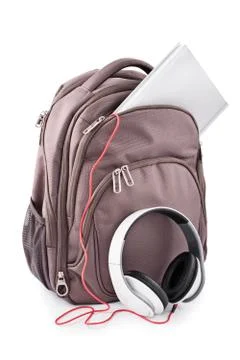 Backpack with headphones and notebook Stock Photos