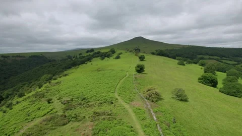 Backpack hiker on the Sugar Loaf, mountain peak, Abergavenny, Monmouthshire.. Video stock 277548360