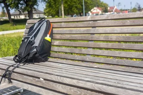 Backpack left on the bench, Concept, suspicious luggage, lost items Foto stock