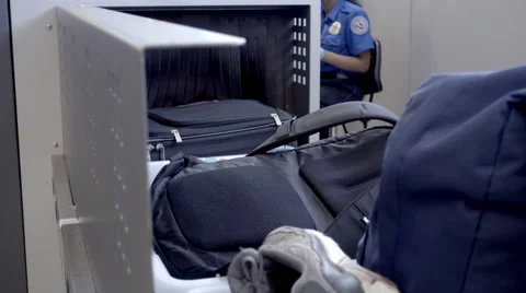 Backpack in luggage and baggage security check at JFK airport in 4K Stock Footage 65339454