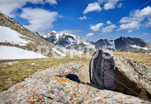 Backpack in the mountains Stock Photos