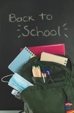 Backpack ready for the return to school. Covid-19 concept. Stock Photos