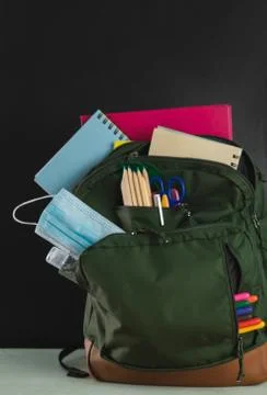 Backpack ready for the return to school. Covid-19 concept. Copy space. Foto stock