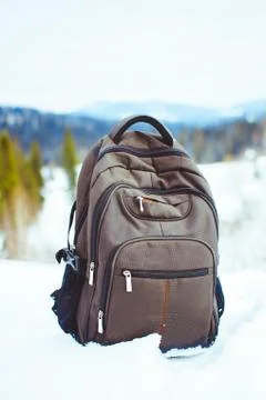 Backpack in the snow Stock Photos
