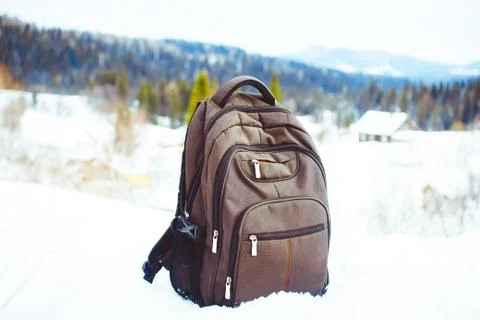 Backpack in the snow 库存照片