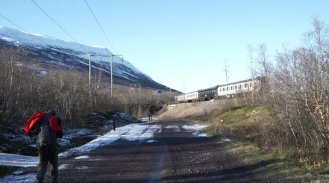 Backpacker and Train in Winter Stock-Footage 56451486