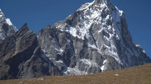 Backpacker climbs in the mountains Stock Footage 85063443