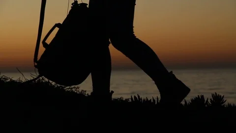 Backpacker dropping bags by the ocean view Stock Footage 123201861