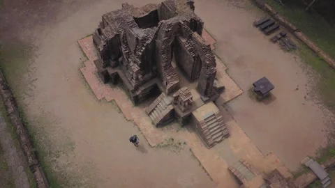 Backpacker exploring my son sanctuary ancient hindu temple ruins Stock Footage 329484859