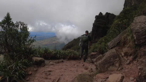 Backpacker hiking on Roraima Mount, Canaima national park, Venezuela Stock Footage 244859902