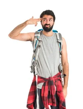 Backpacker making suicide gesture over white background Stock Photos