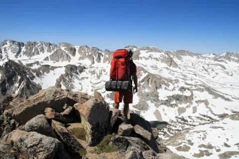 Backpacker on mountain Stock Photos